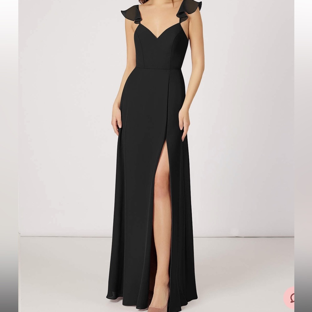 Black gown with silver belt that is sewn on front. Worn once and dry cleaned